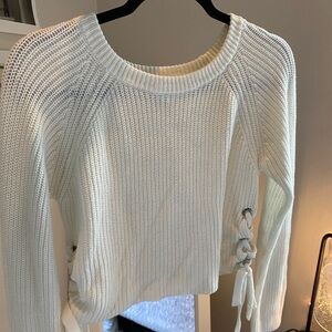 White knit sweater with lace up sides